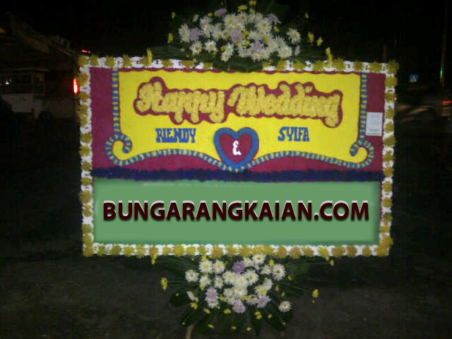 Kirim Karangan Bunga Papan Wedding ke Cilacap Jawa Tengah