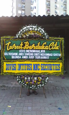 bunga papan duka cita