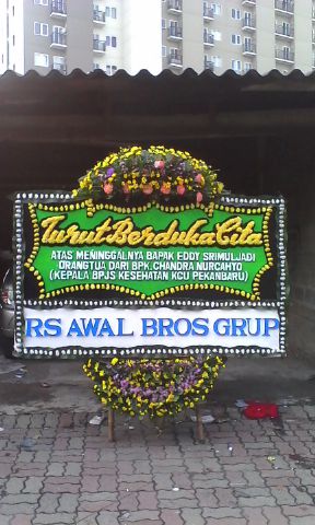 bunga papan duka cita