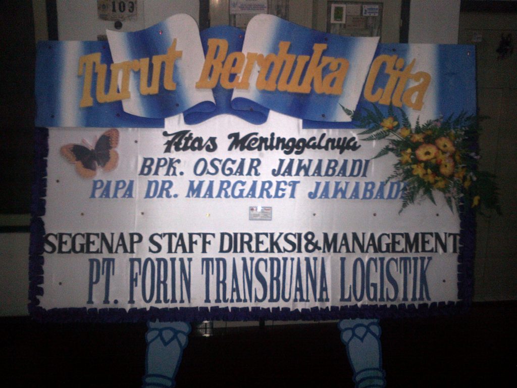 karangan bunga papan duka cita jember